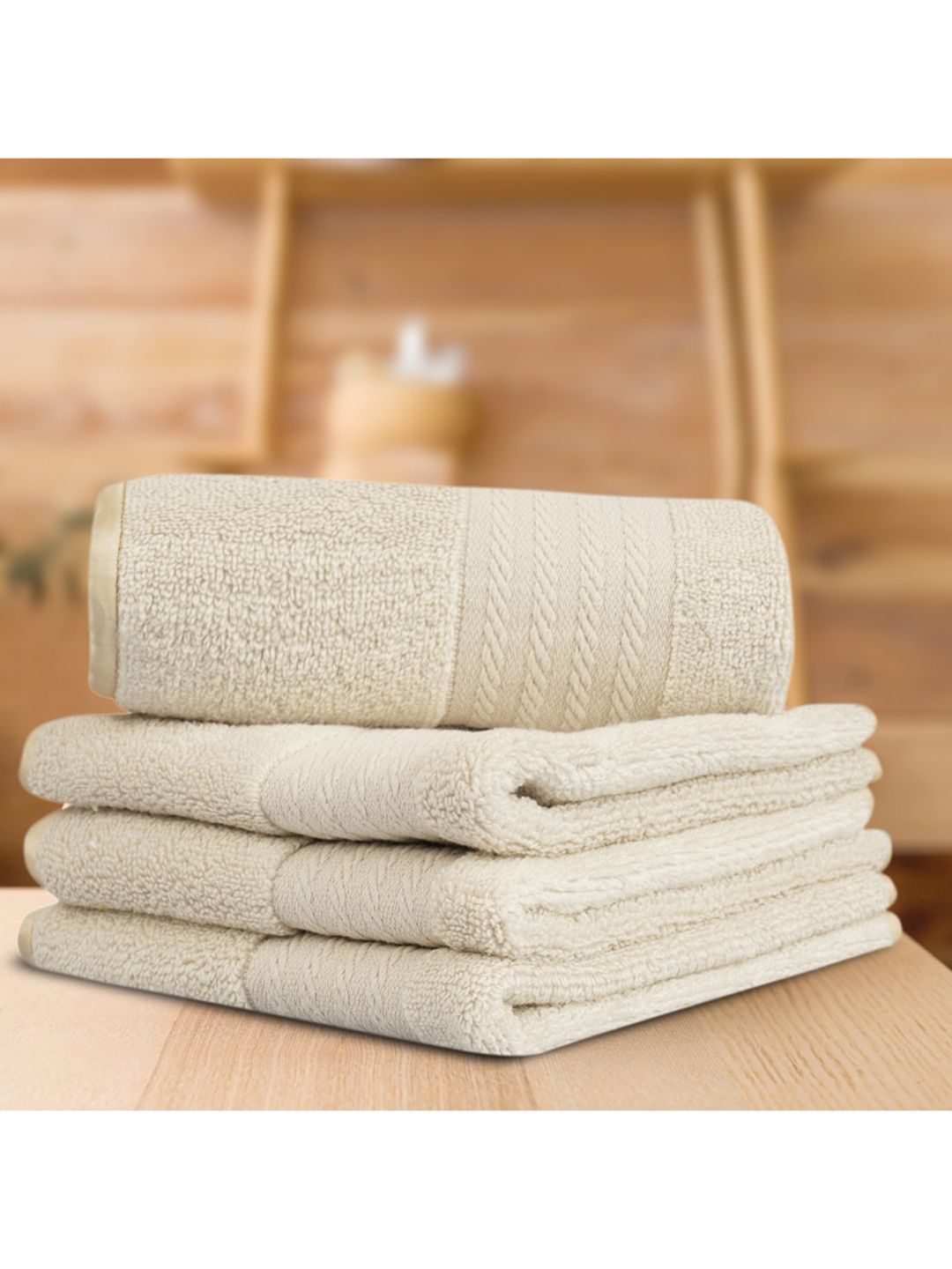 LUSH & BEYOND Set Of 4 Beige Solid 500 GSM Pure Cotton Face Towels Price in India