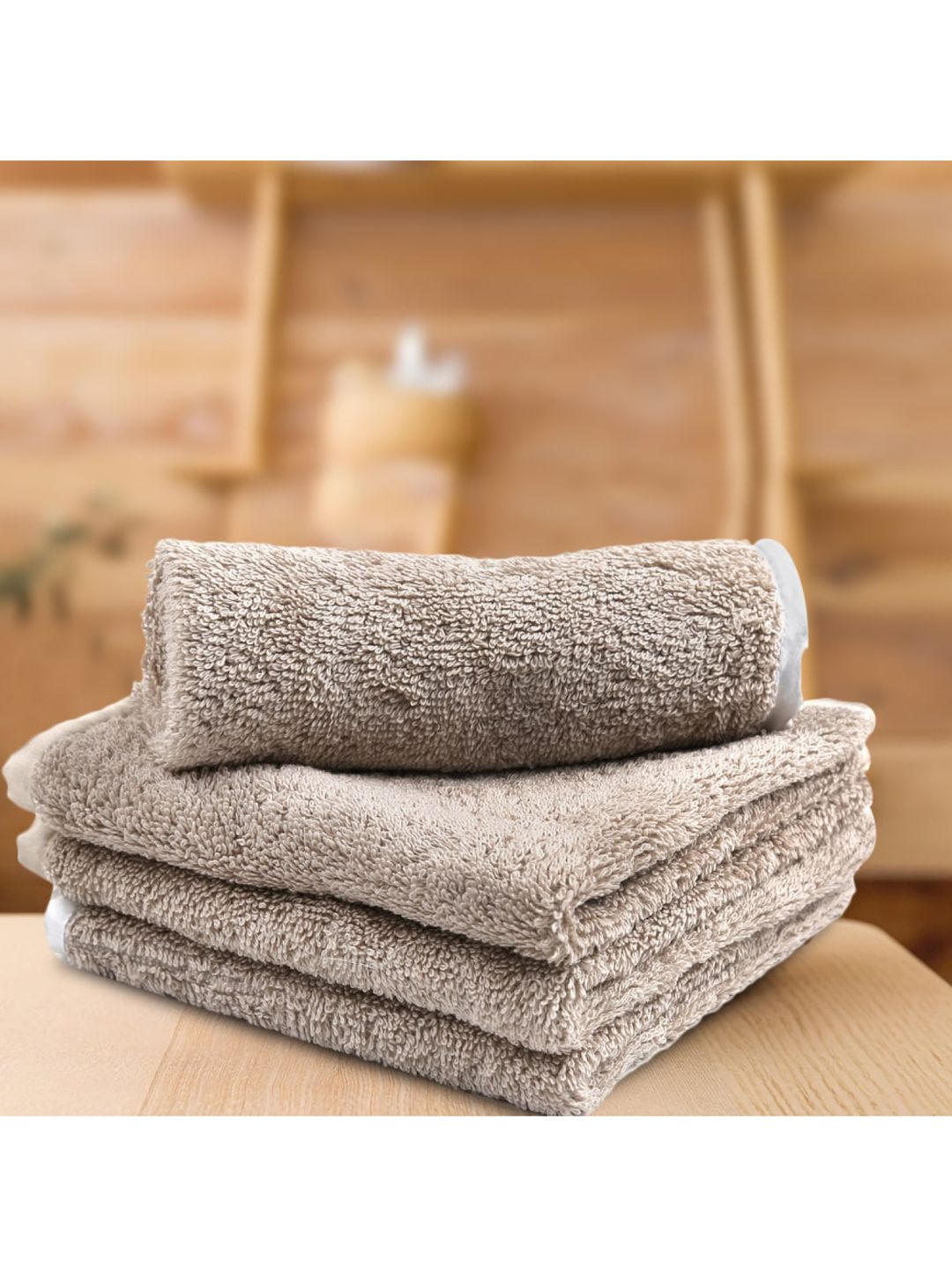 LUSH & BEYOND Set Of 4 Beige Solid 500 GSM Pure Cotton Face Towels Price in India