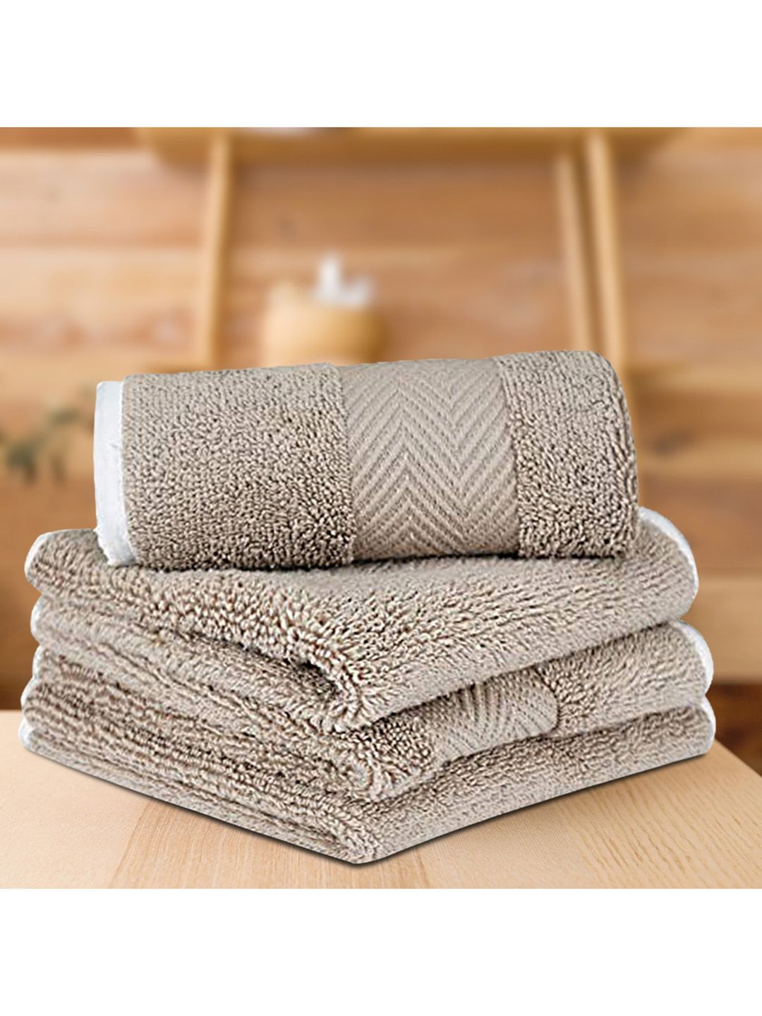 LUSH & BEYOND Set Of 4 Beige Solid 500 GSM Cotton Face Towels Price in India