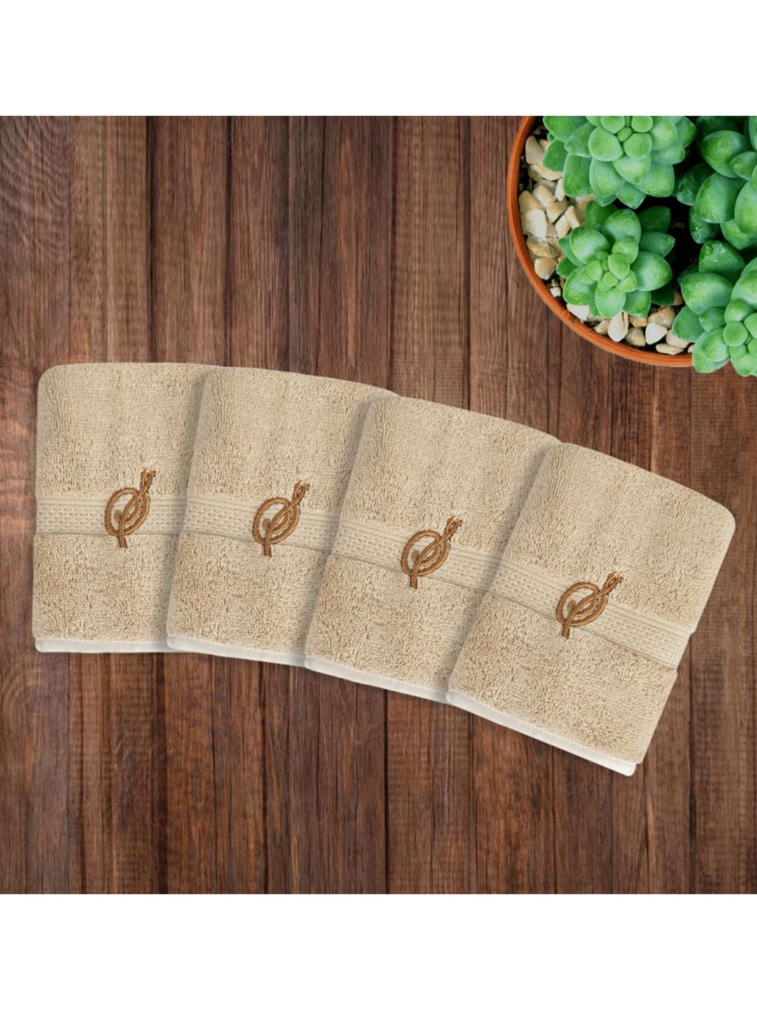 LUSH & BEYOND Set of 4 Beige Solid 500 GSM  Pure Cotton Face Towels Price in India