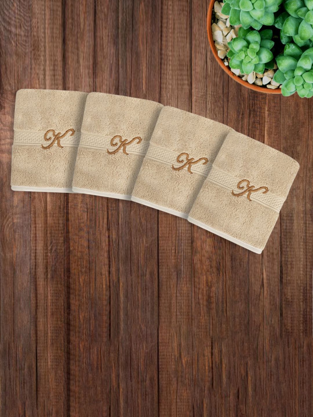 LUSH & BEYOND Set Of 4 Beige Solid 500 GSM Pure Cotton Face Towels With Initial "K" Price in India