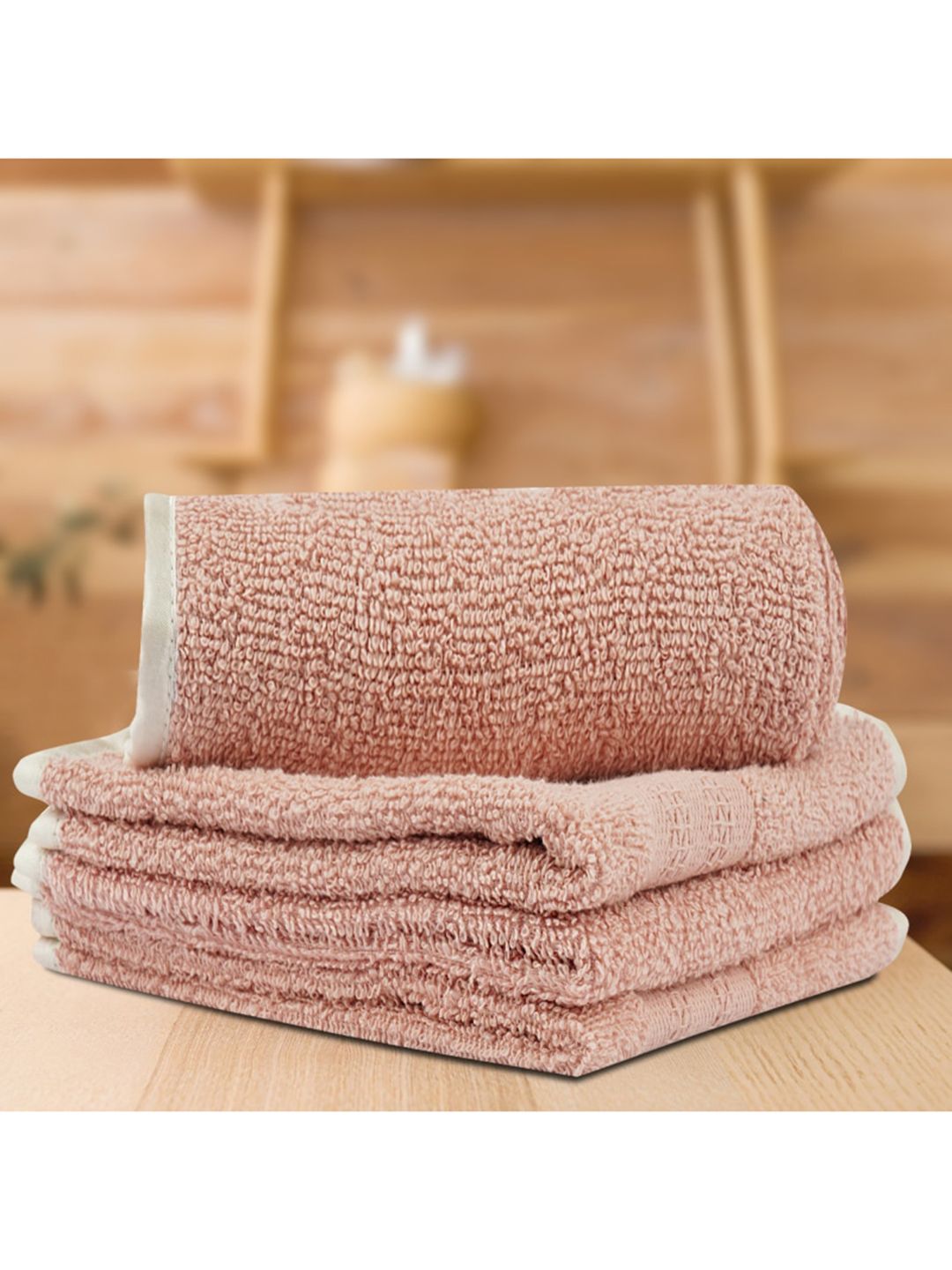 LUSH & BEYOND Set Of 4 Peach Solid 500 GSM Cotton Face Towels Price in India