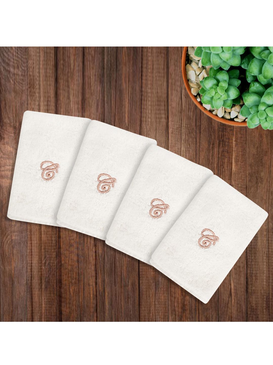 LUSH & BEYOND Set Of 4 White Solid 500 GSM Pure Cotton Face Towels Price in India