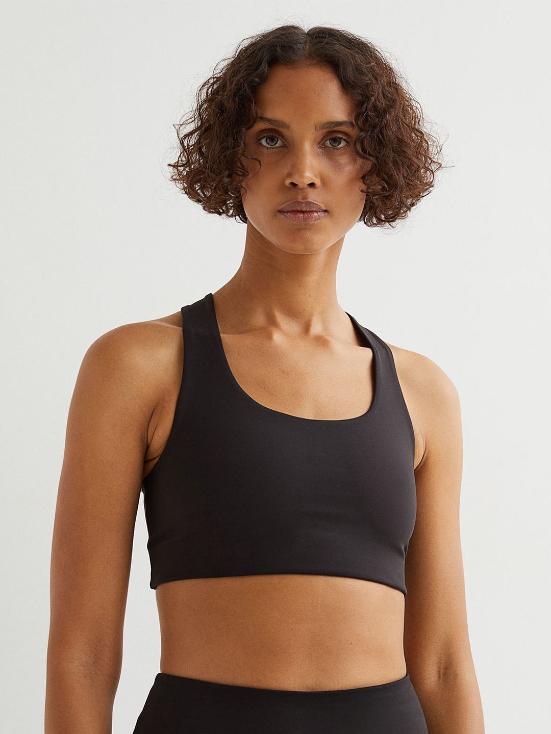 H&M Black Solid Medium Support Sports Bra Price in India