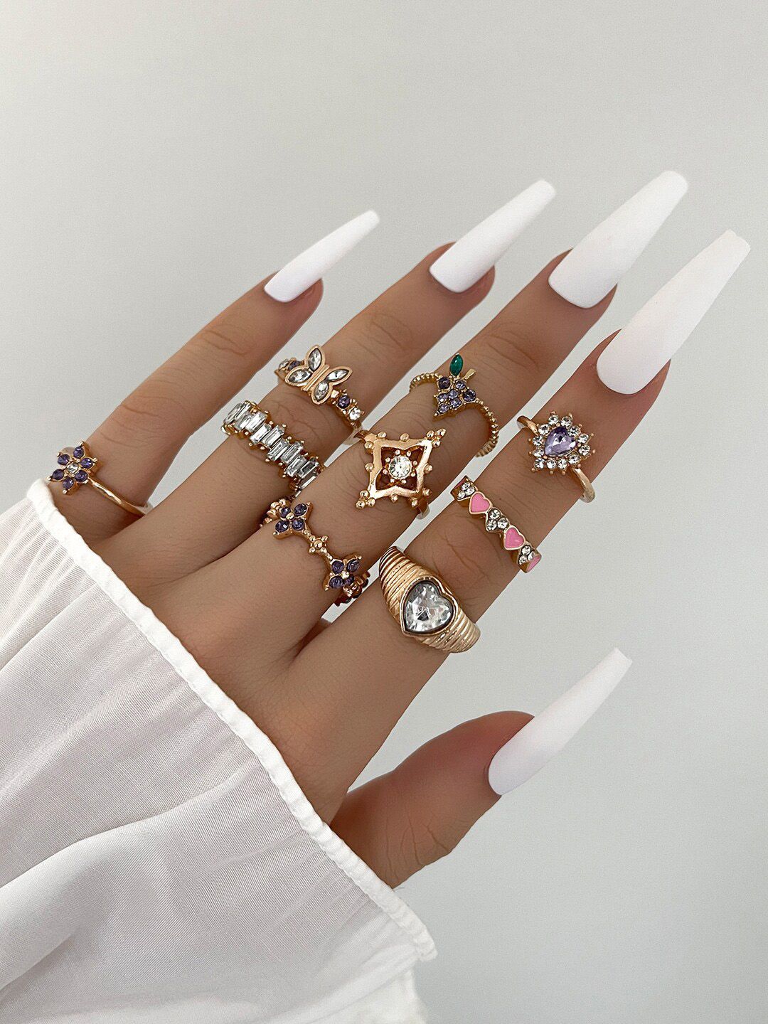 Shining Diva Fashion Set of 9 Gold-Plated Crystal Studded Finger Rings Price in India