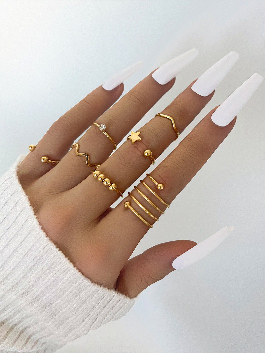 Shining Diva Fashion Set Of 7 Gold-Plated White Crystal-Studded Finger Rings Price in India