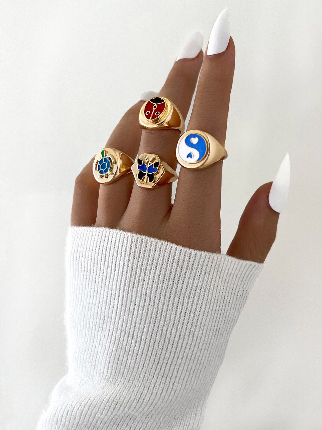 Shining Diva Fashion Set Of 4 Red & Blue Gold-Plated Enamelled Boho Finger Rings Price in India