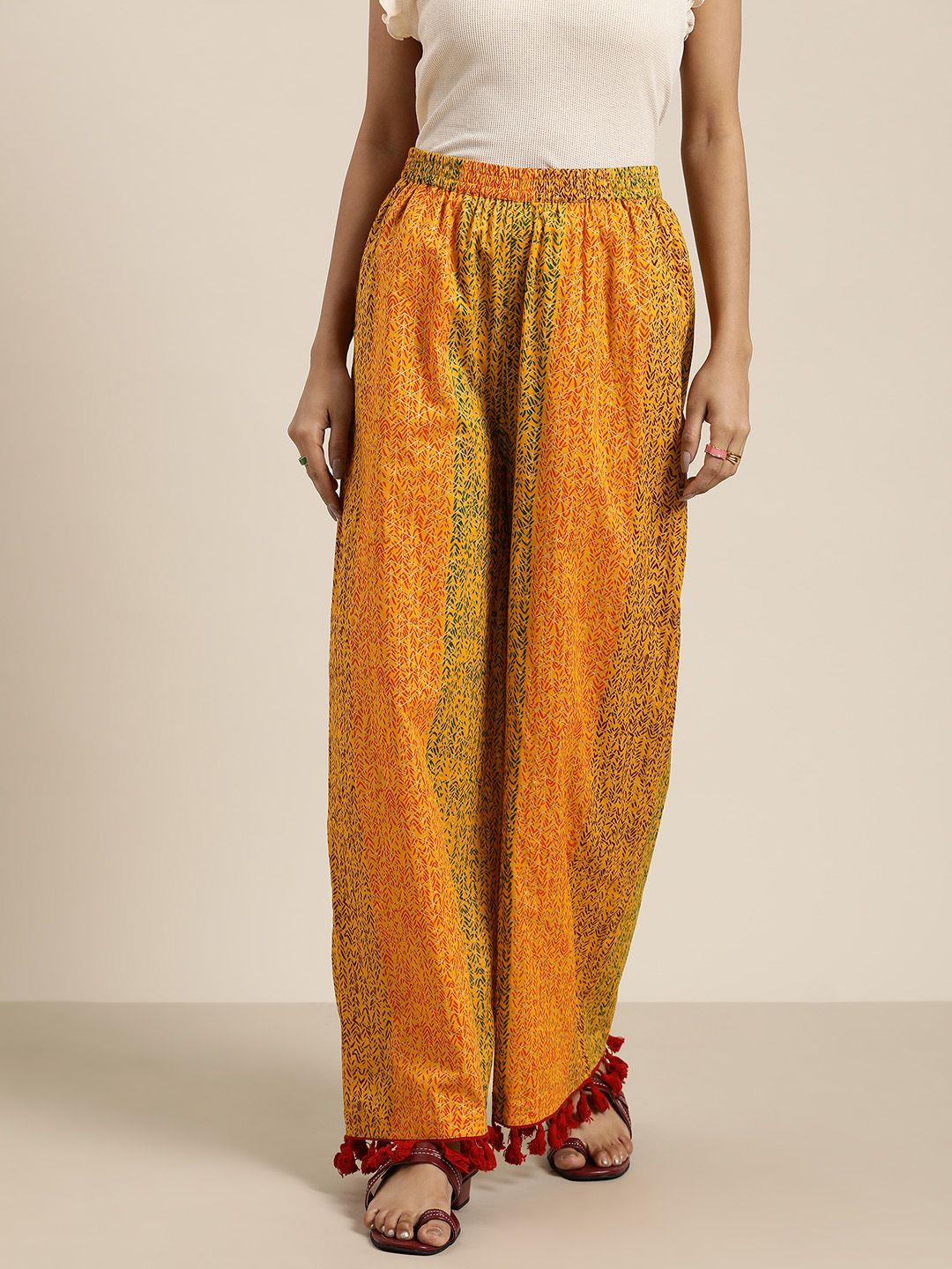 Sangria Women Mustard Yellow & Green Printed Pure Cotton Flared Palazzos Price in India