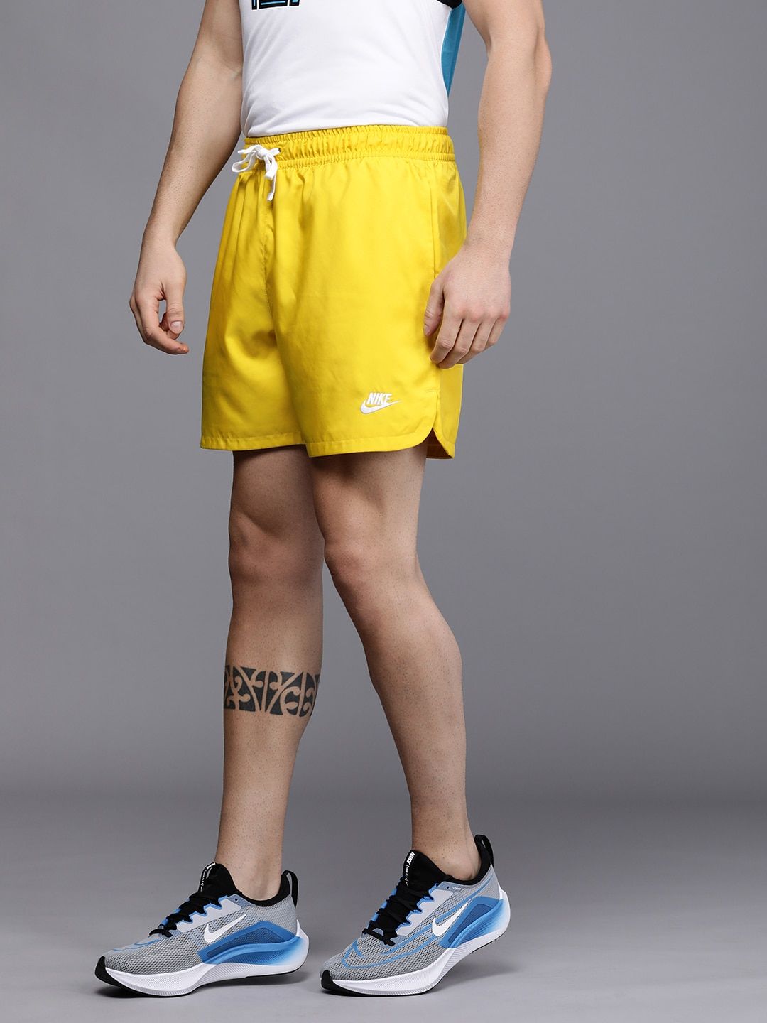 nike shorts men yellow