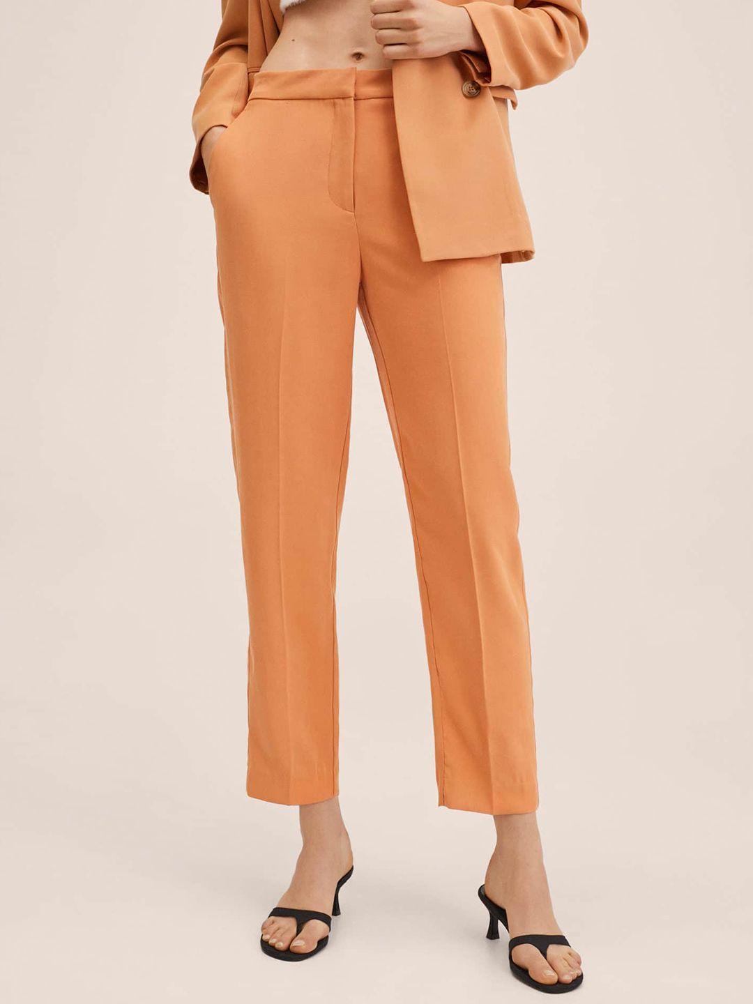 MANGO Women Peach-Coloured Solid Trousers Price in India