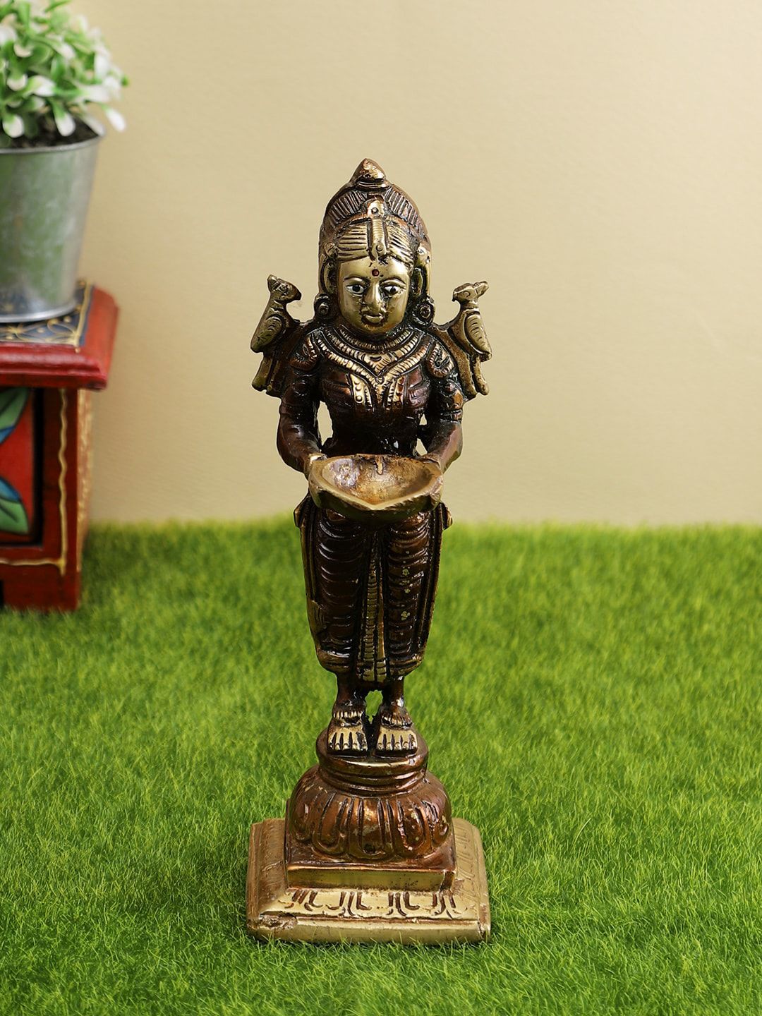 Aapno Rajasthan Brown & Gold Goddess Laxmi Brass Showpiece Price in India
