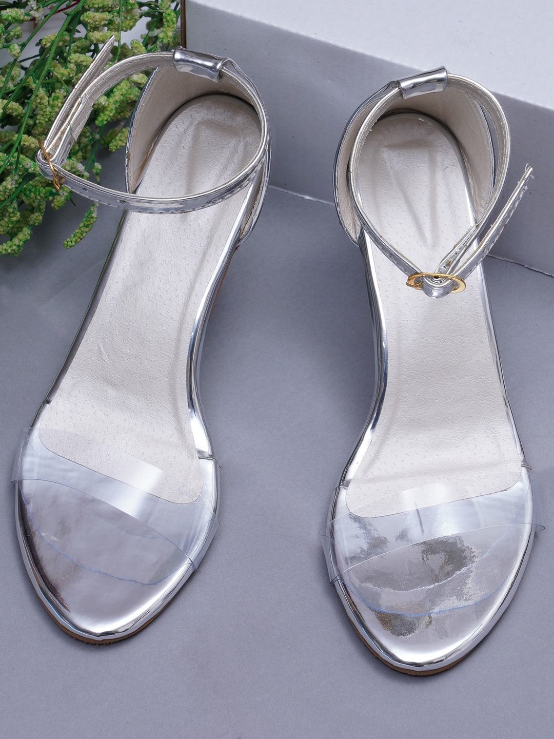 Misto Women Transparent & Silver-Toned Slim Heels Price in India