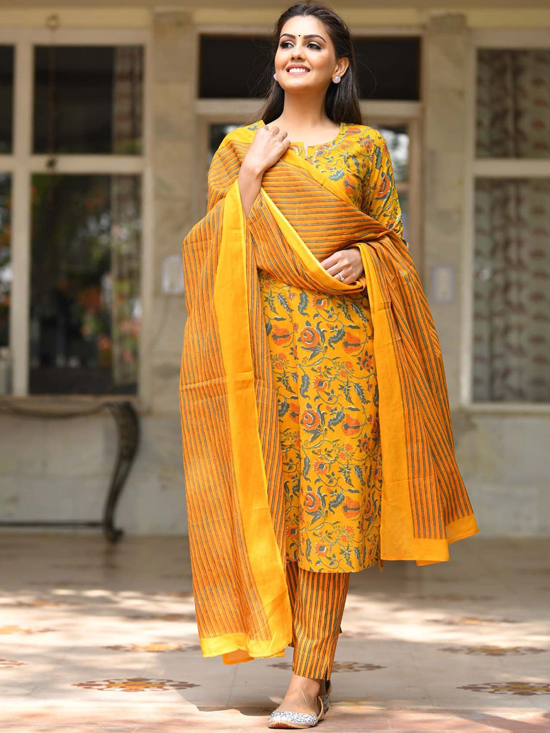 KAAJH Women Yellow Floral Printed Cotton Kurta With Trousers & With Dupatta Price in India