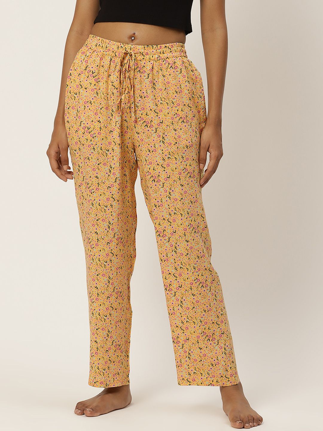 Not Just Pyjamas Women Yellow Printed Lounge Pants Price in India