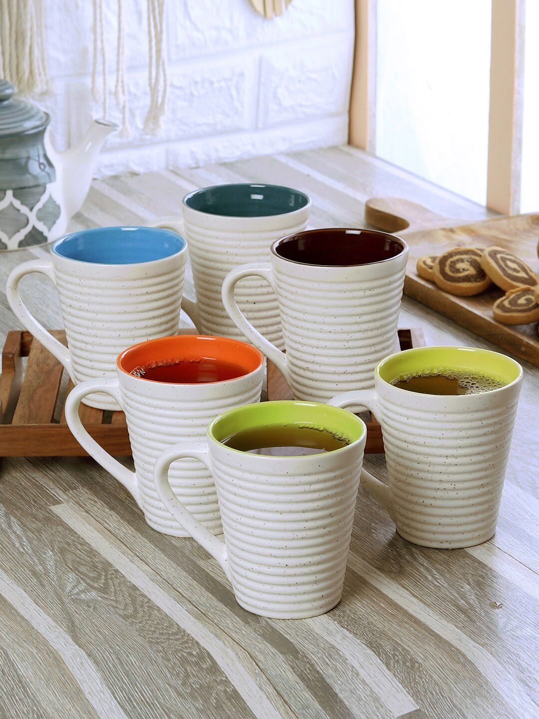 CDI Set of 6 White Textured Ceramic Matte Cups With Wooden Tray Price in India