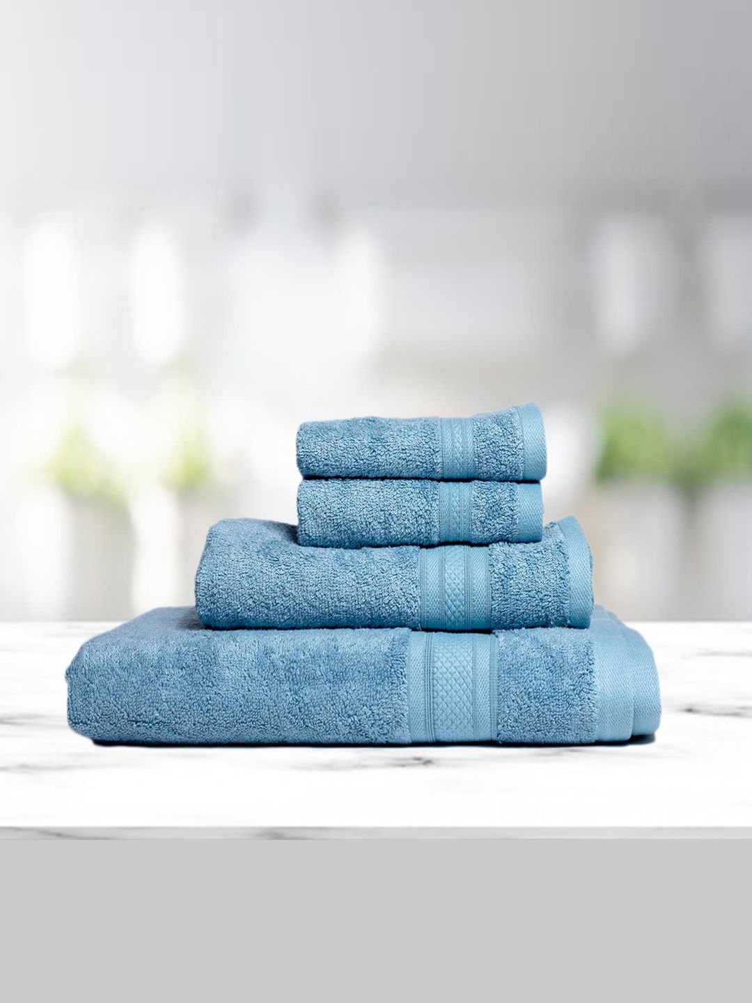 Kawach Set Of 4 Blue Solid 550 GSM Anti-Microbial Towel Set Price in India