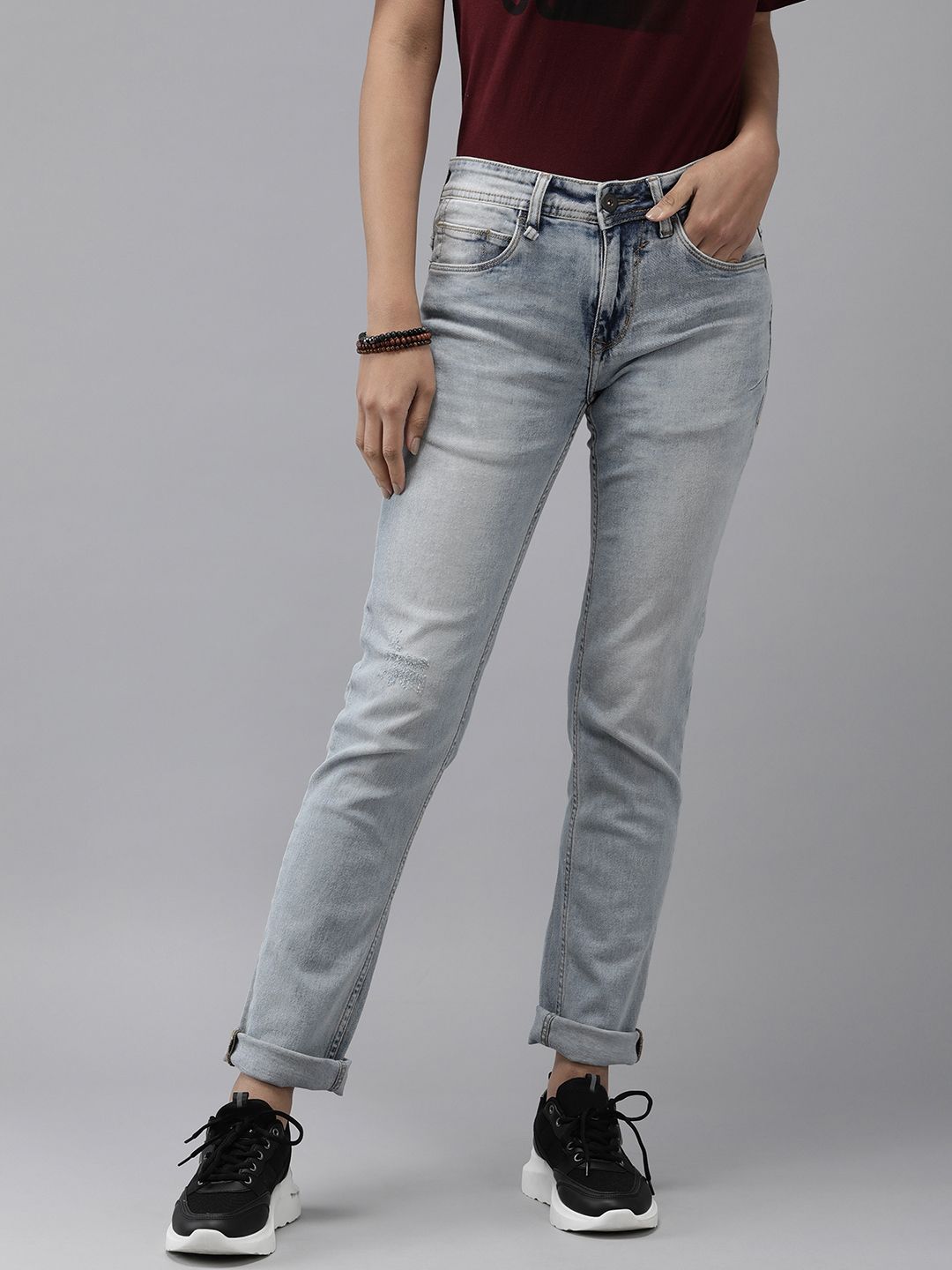 The Roadster Lifestyle Co Women Blue Slim Fit Low Distress Mid-Rise Stretchable Jeans Price in India