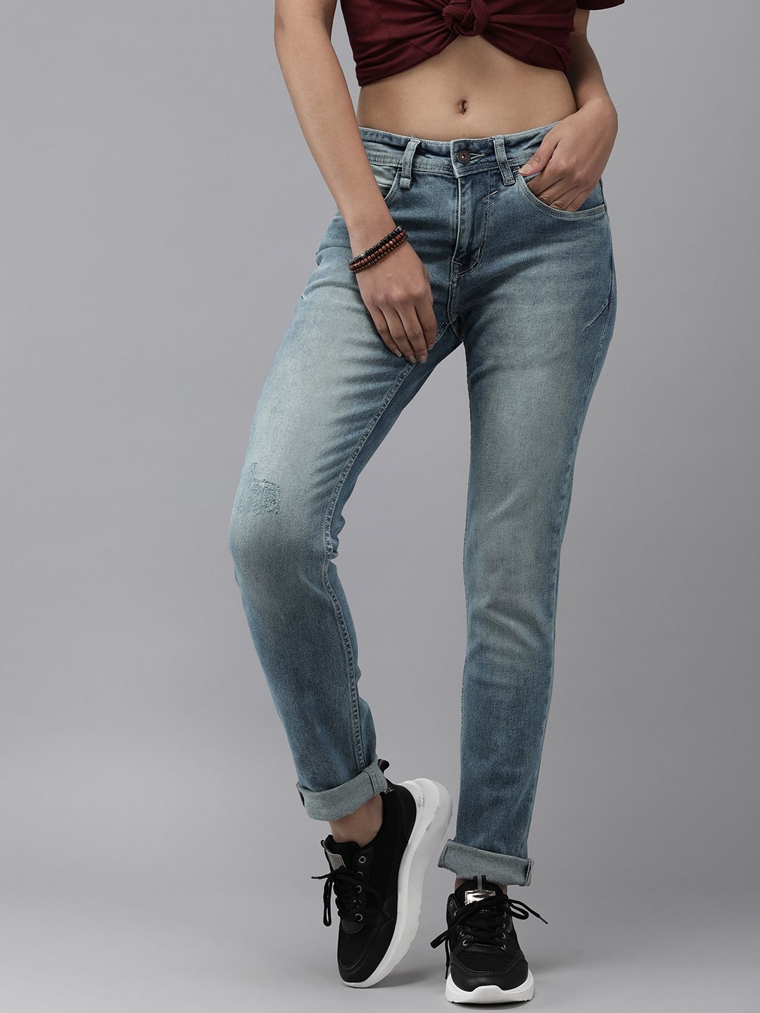 The Roadster Lifestyle Co Women Blue Slim Fit Light Fade Mid-Rise Stretchable Jeans Price in India