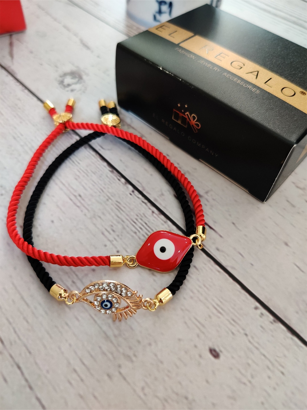 EL REGALO Set Of 2 Gold-Plated & Red Charm Bracelet Price in India