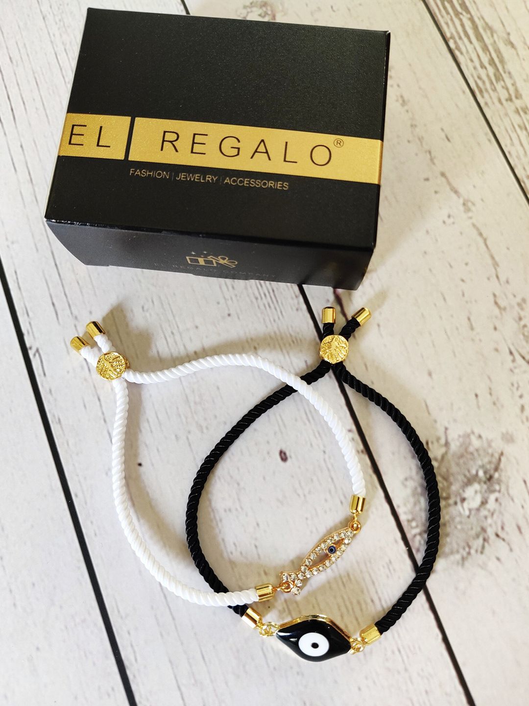 EL REGALO Unisex Set of 2 White & Black Handcrafted Gold-Plated Charm Bracelet Price in India