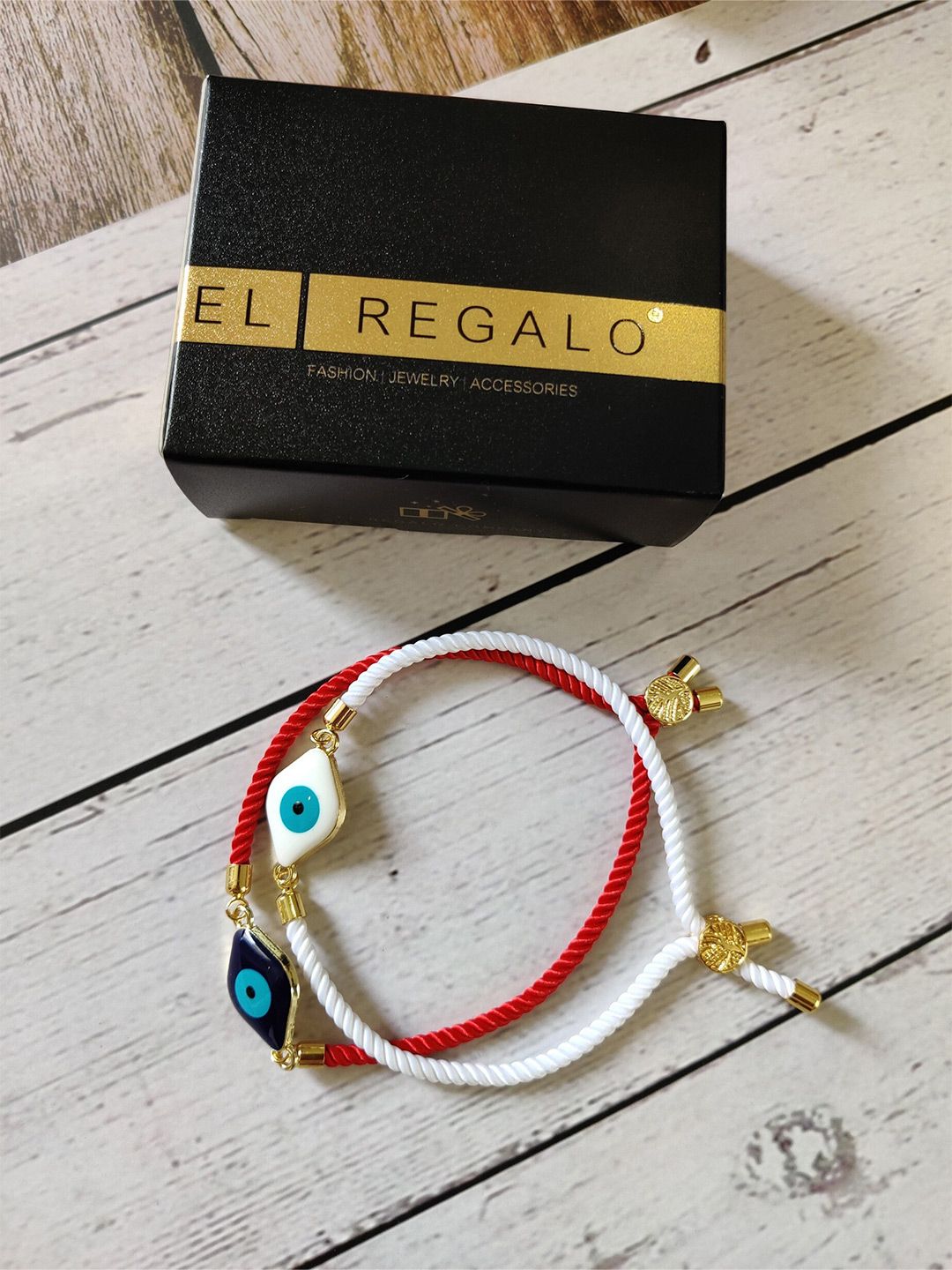 EL REGALO Unisex White & Red Set of 2 Handcrafted Gold-Plated Charm Bracelet Price in India