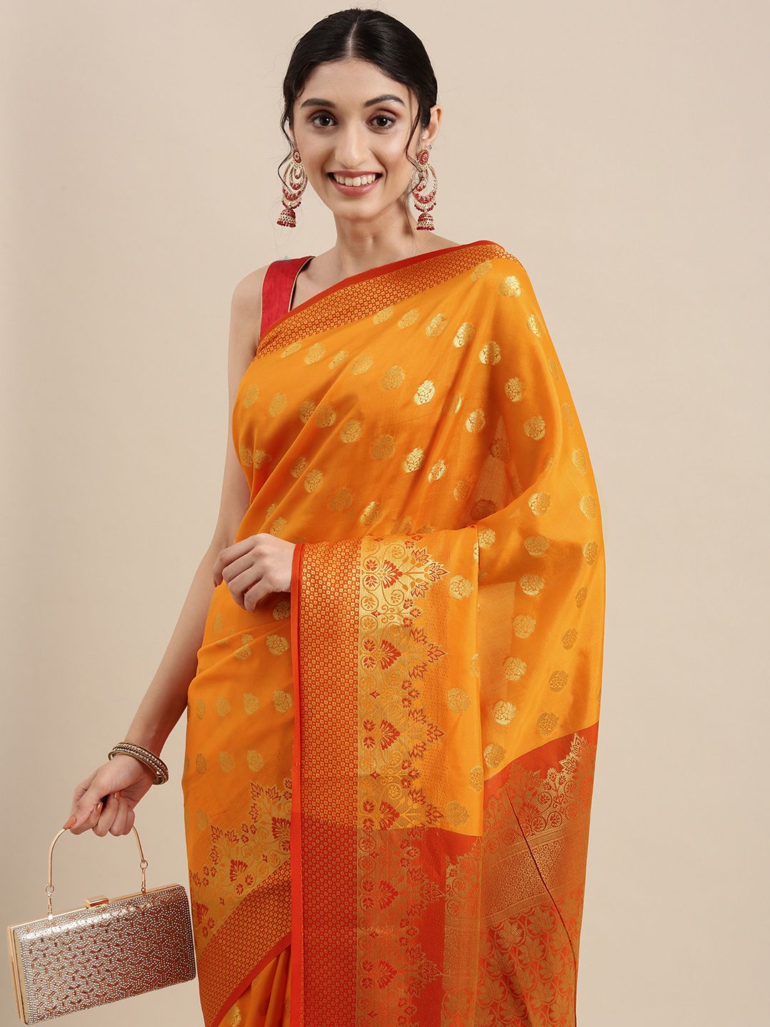 Mitera Orange & Gold Ethnic Motifs Zari Silk Cotton Celebrity Banarasi Saree Price in India