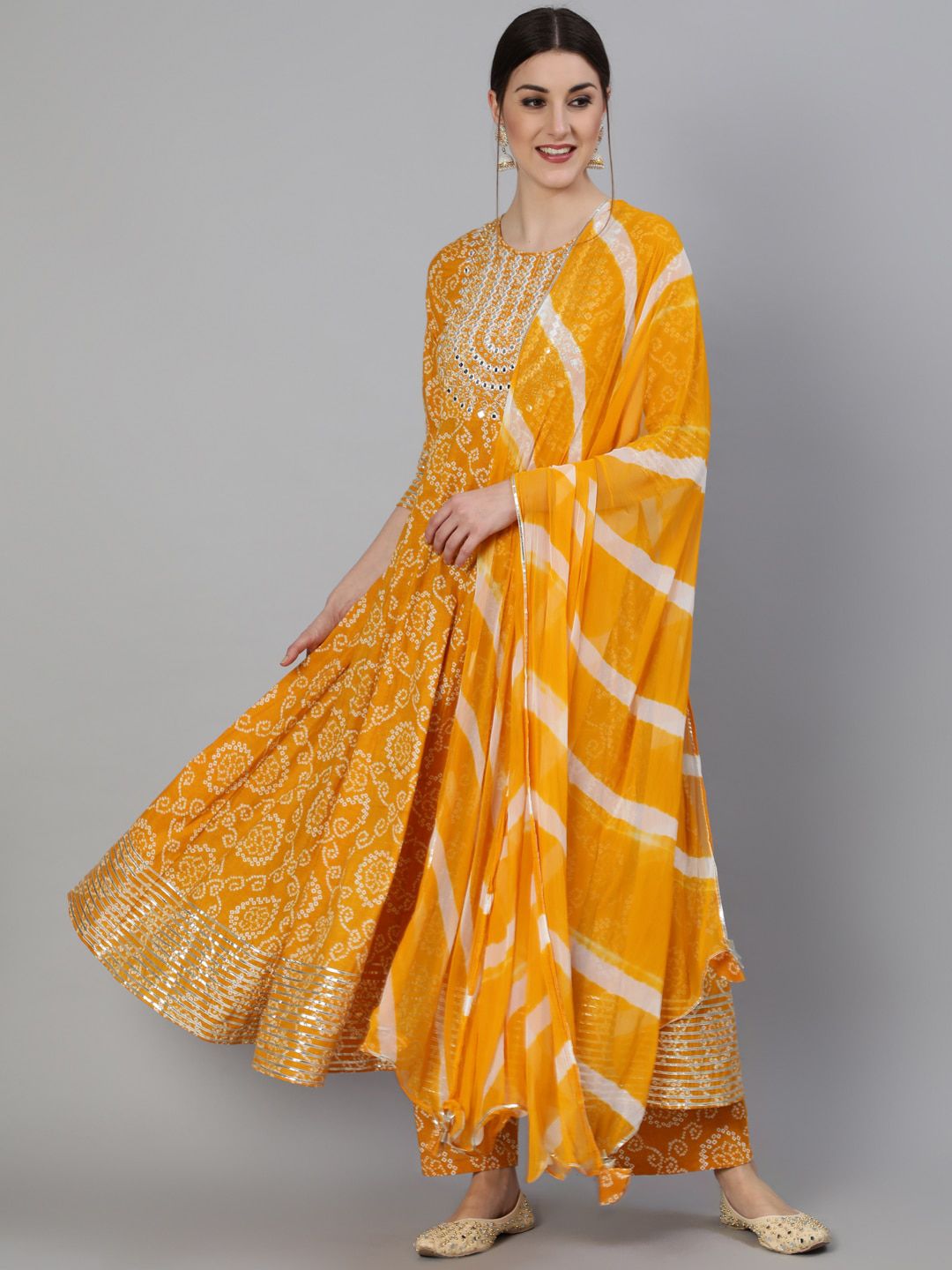 KIMAYRA Women Mustard Yellow Bandhani Printed Mirror Work Kurta with Palazzos Price in India