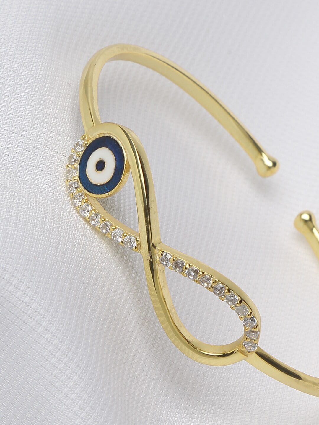 EK BY EKTA KAPOOR Women Gold-Plated  Infinity Evil Eye Brass Cuff Bracelet Price in India