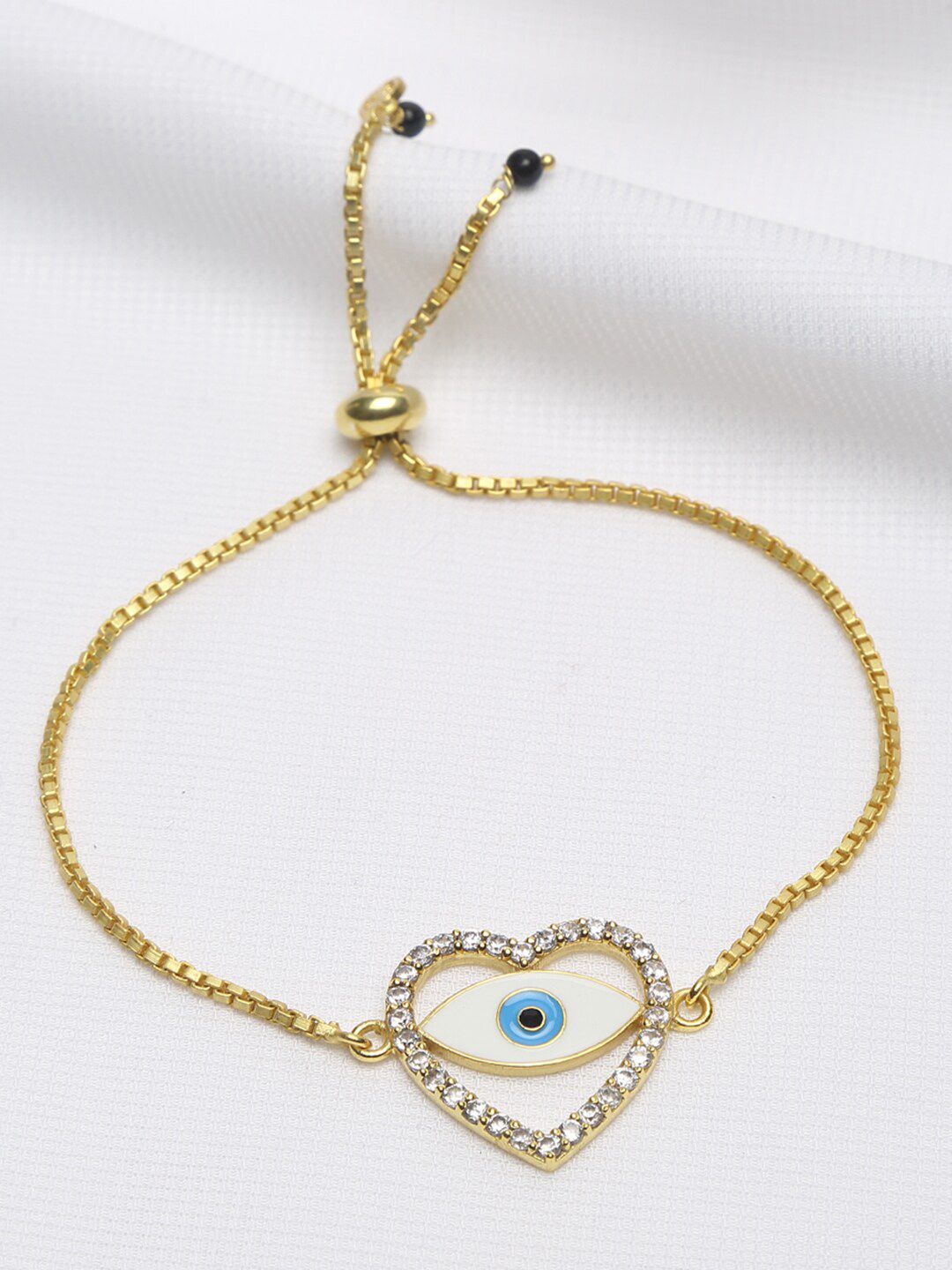EK BY EKTA KAPOOR Women Gold-Plated & Blue Heart Evil Eye Charm Bracelet Price in India