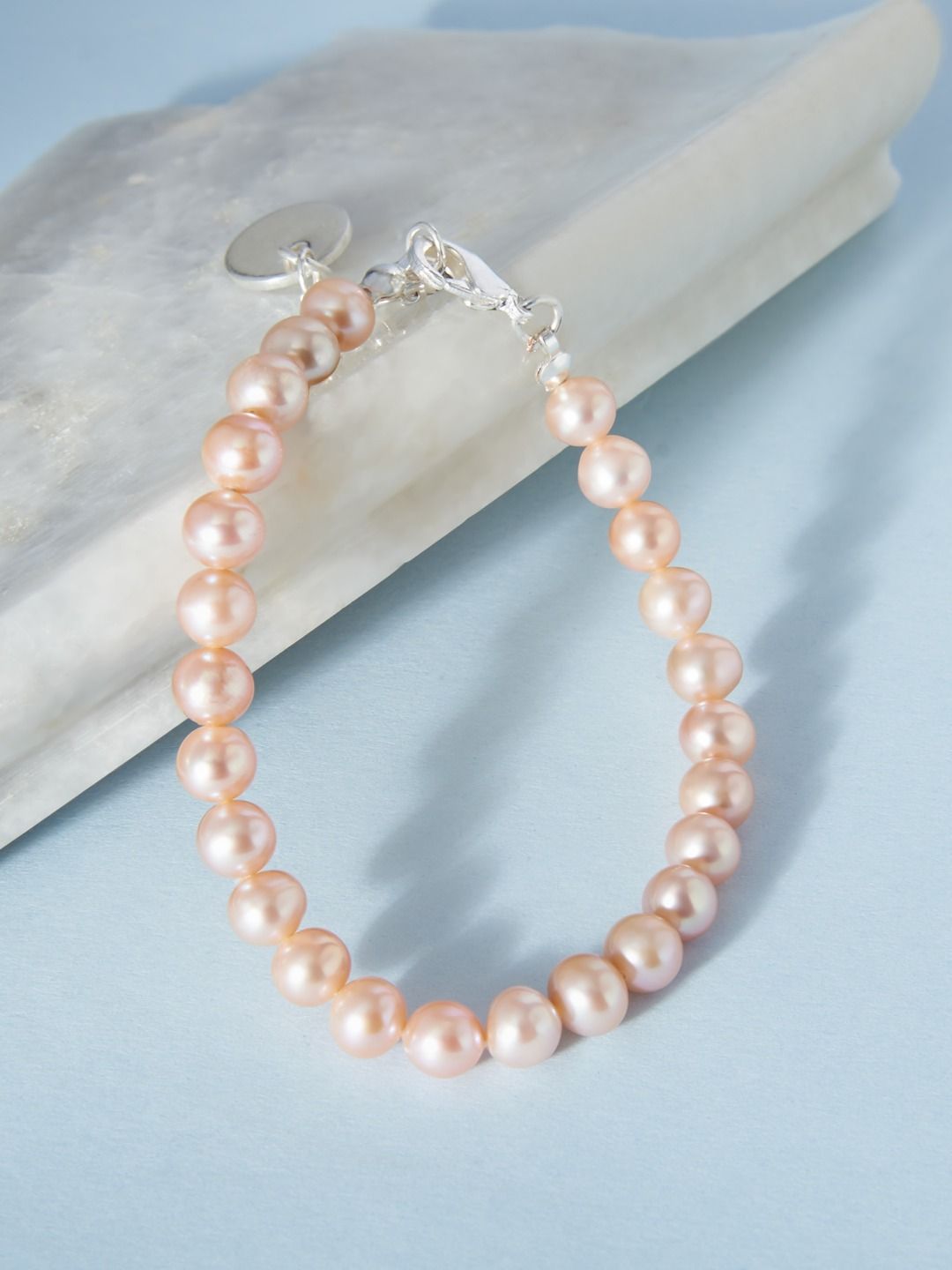 Zaveri Pearls Peach & Silver-Plated Freshwater Natural AAA+ Single Strand Bracelet Price in India