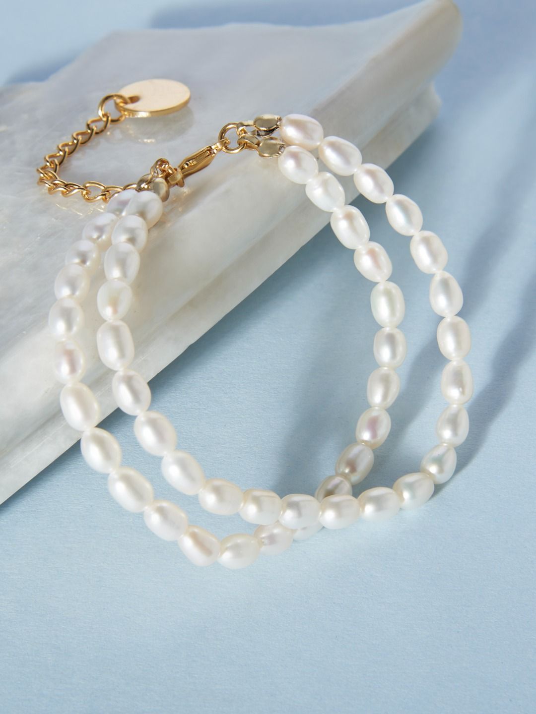 Zaveri Pearls Women Gold-Toned & White Freshwater Natural Pearls Multistrand Bracelet Price in India
