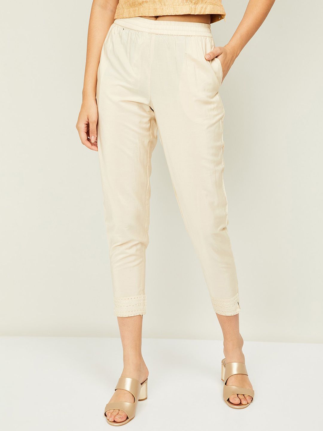 Melange by Lifestyle Women Beige Solid Cropped Trousers Price in India