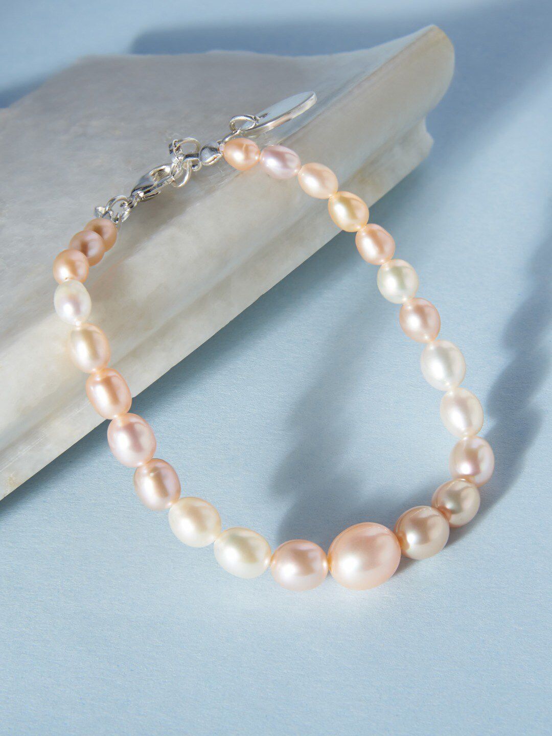 Zaveri Pearls Women Off White & Silver-Plated Wraparound Freshwater Natural Pearl Bracelet Price in India