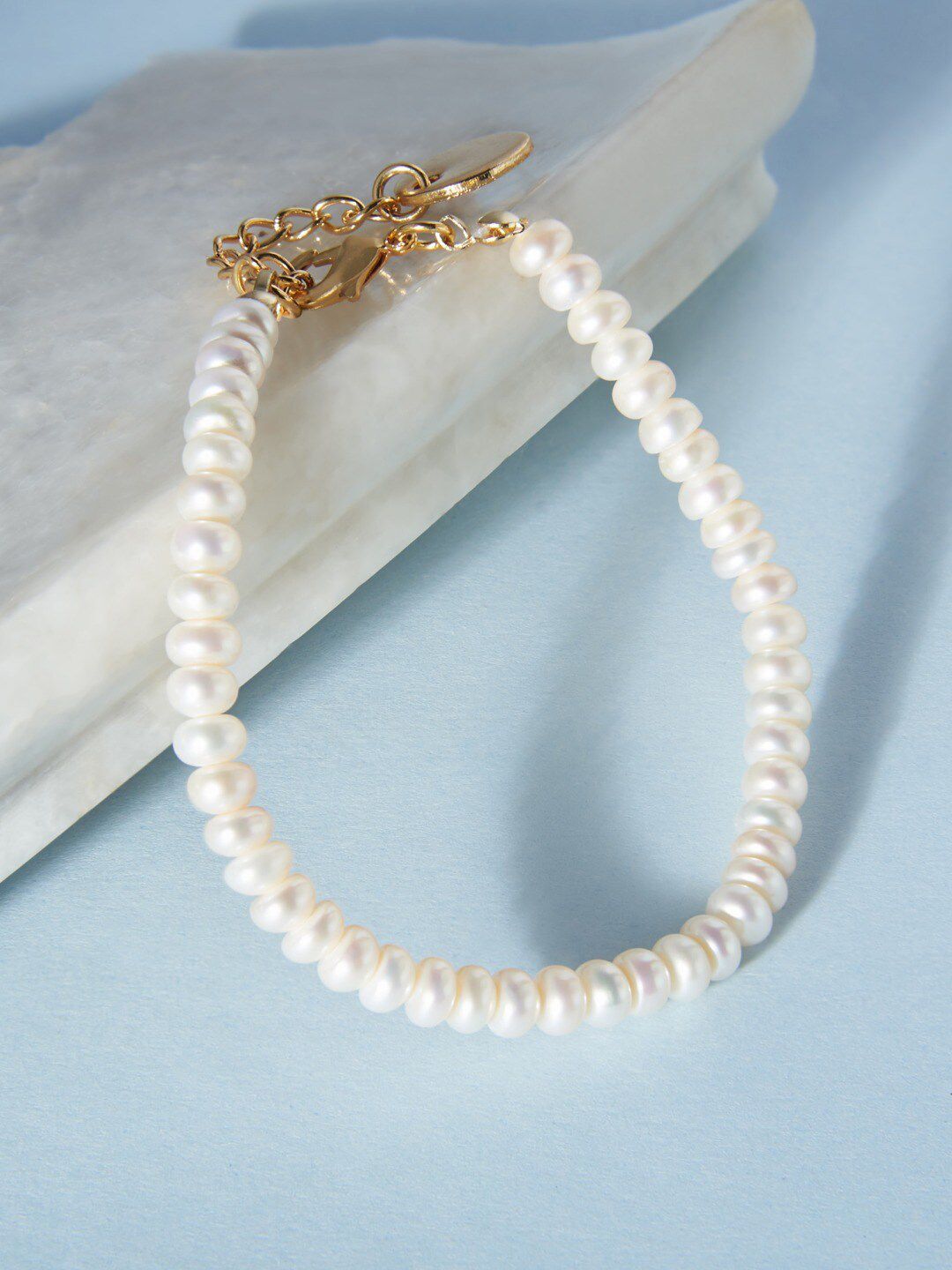 Zaveri Pearls White Freshwater Natural AAA+ Button Single Strand Bracelet Price in India