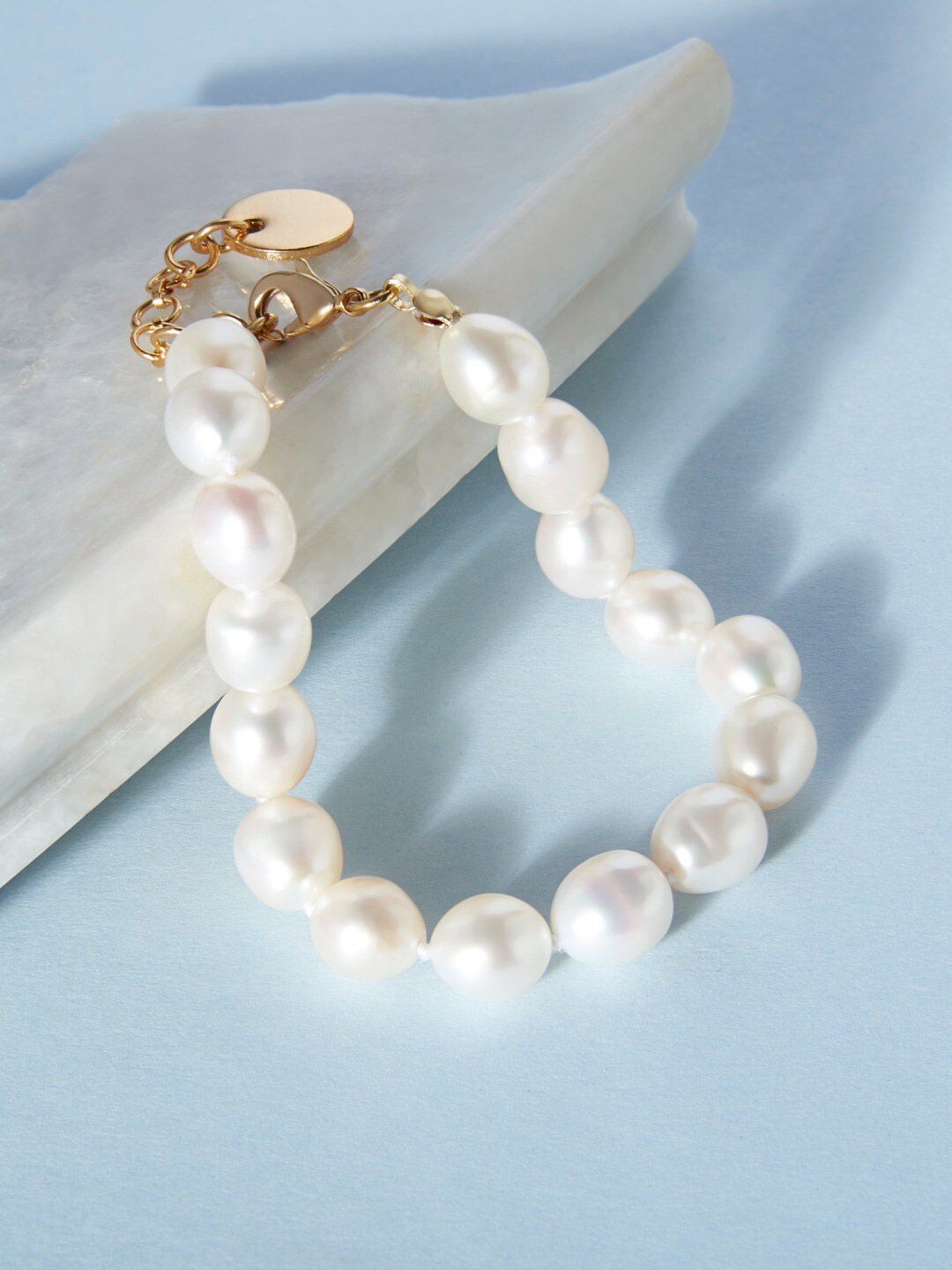 Zaveri Pearls White Gold-Plated Freshwater Natural 8-9 mm AAA+ Rice Single Strand Bracelet Price in India