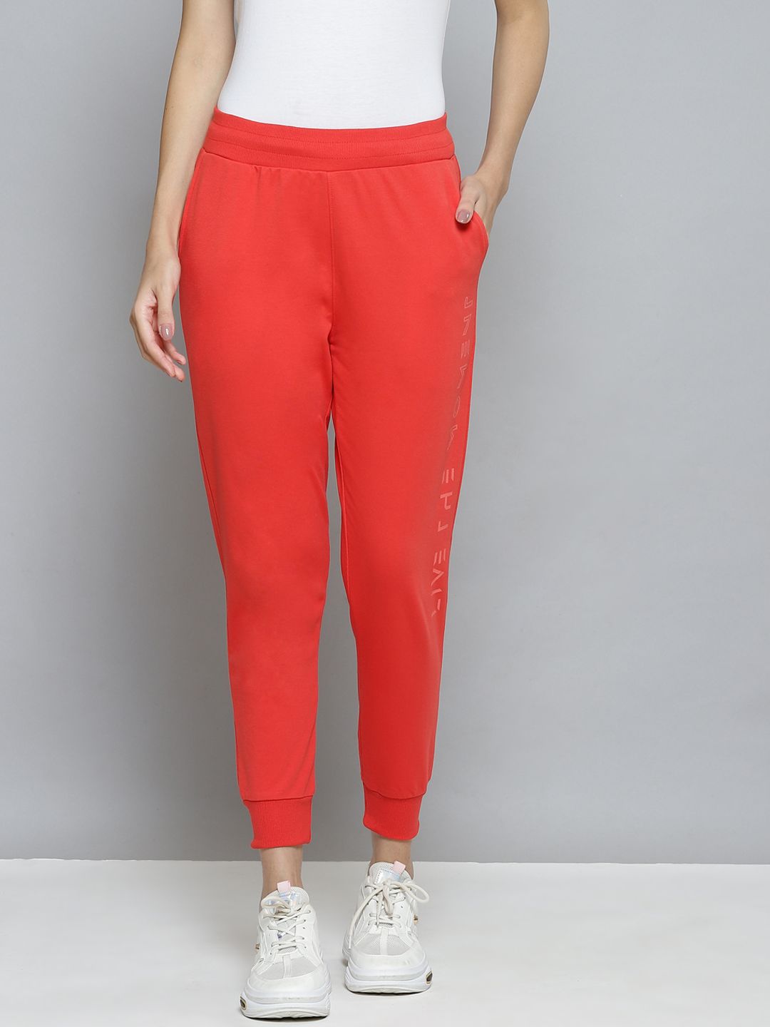 Alcis Women Coral Red Slim Fit Solid Cropped Running Joggers Price in India
