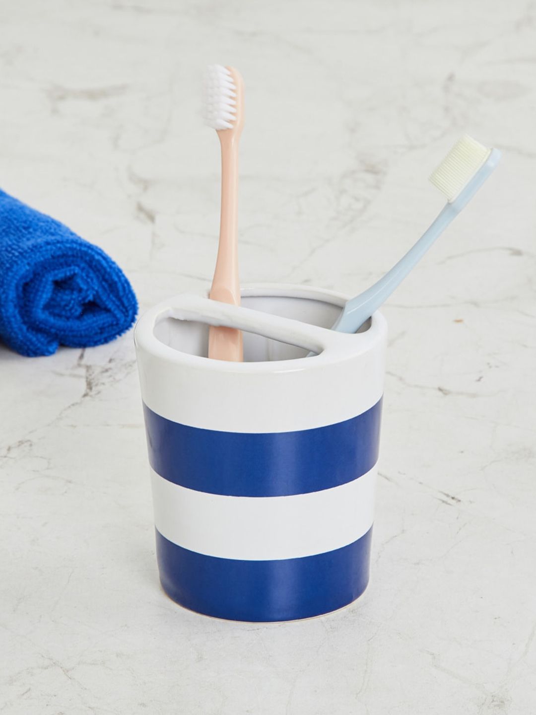 Home Centre Blue & White Colourblocked Ceramic Toothbrush Holder Price in India