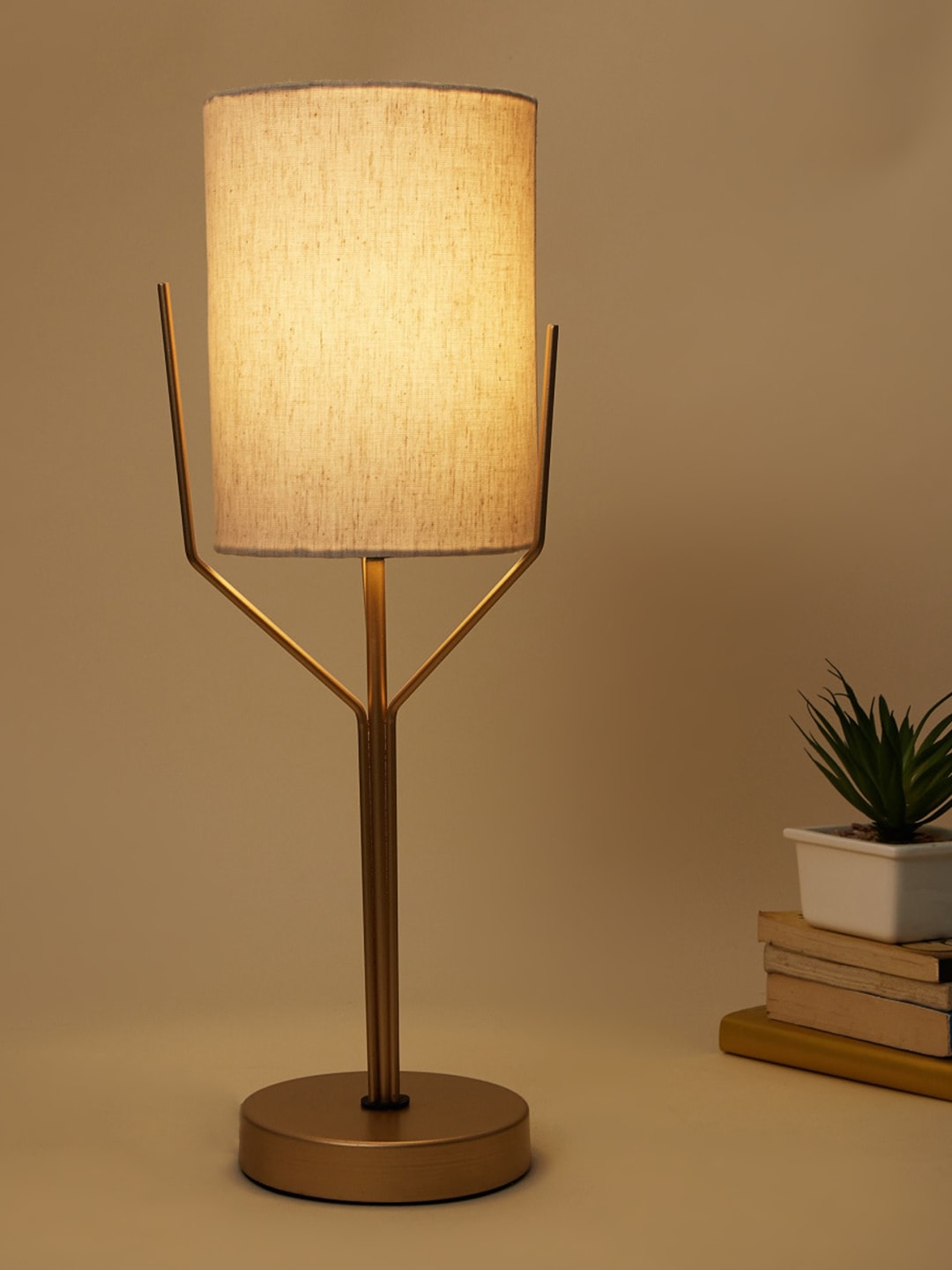 Home Centre Gold-Toned Solid Metal Electric Table Lamp Price in India