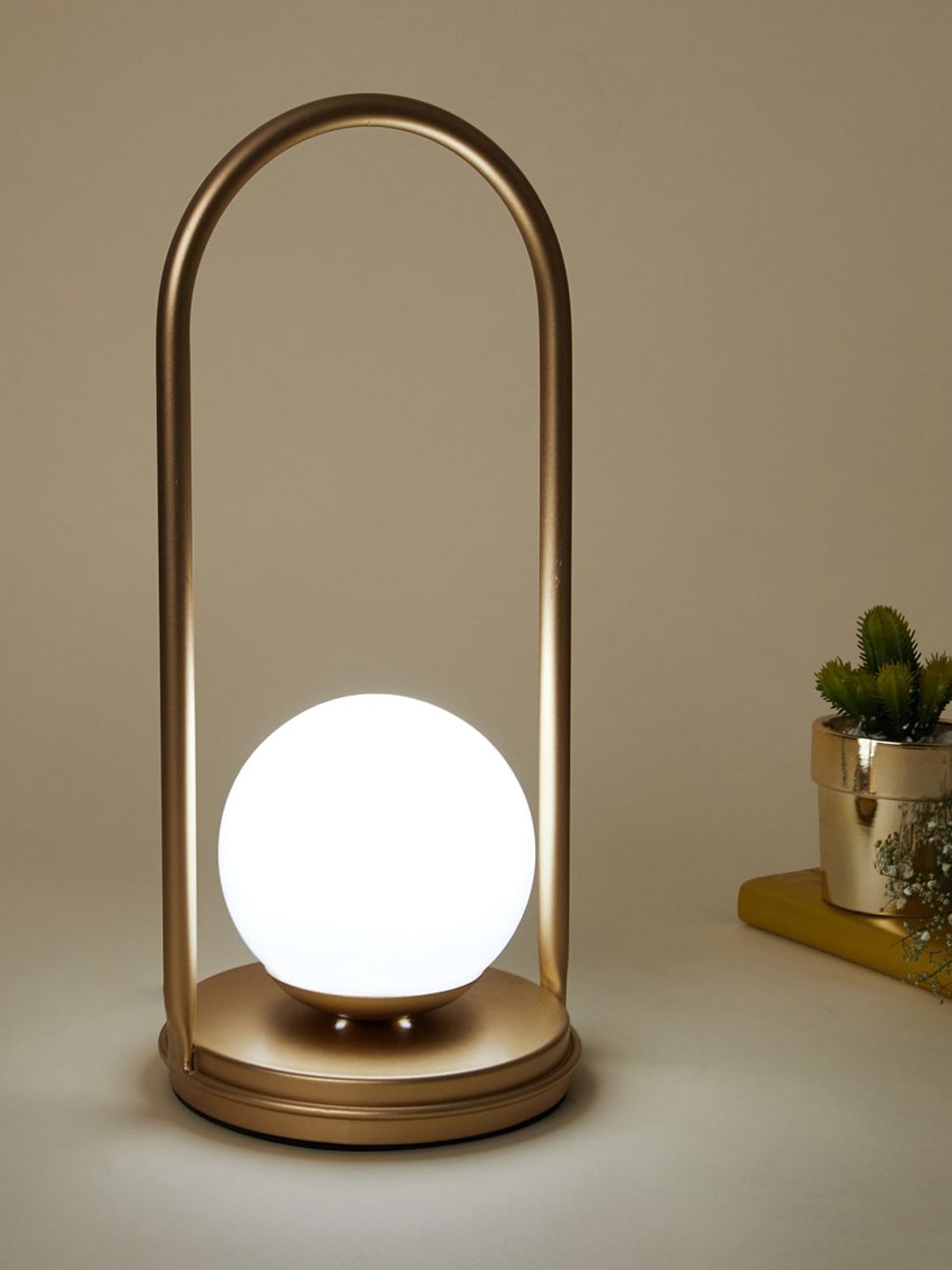 Home Centre Gold Solid Metal Spherical Electric Table Lamp Price in India