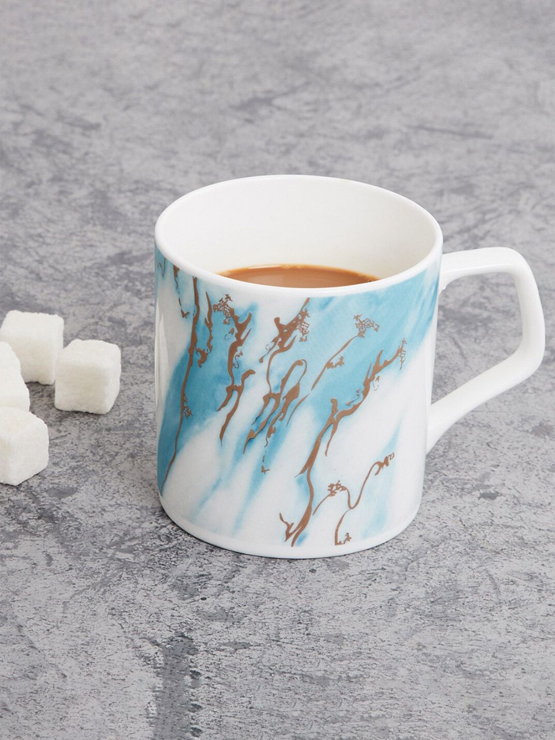 Home Centre White & Blue Printed Bone China Glossy Mug 350ml Price in India