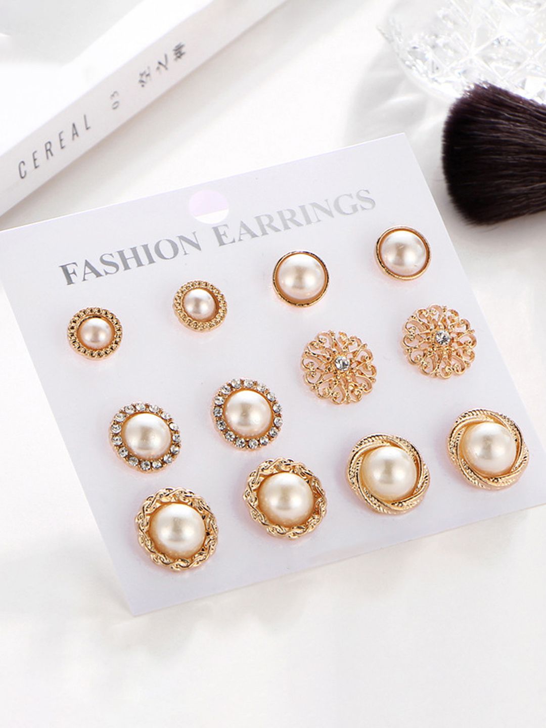 YouBella Gold-Toned & White Contemporary Studs Earrings Price in India