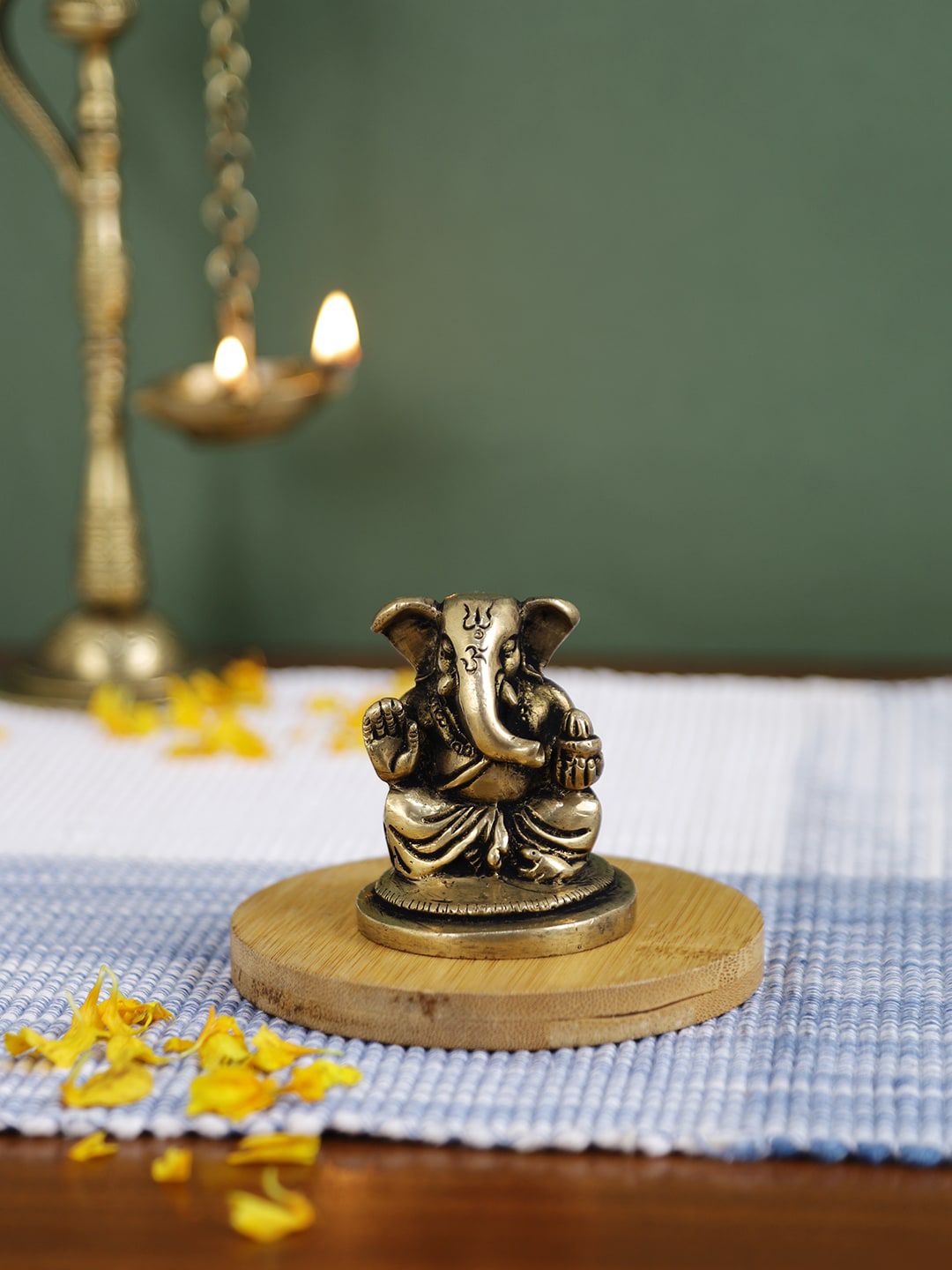Imli Street Gold-Toned Brass Ganesha Idol Showpieces Price in India