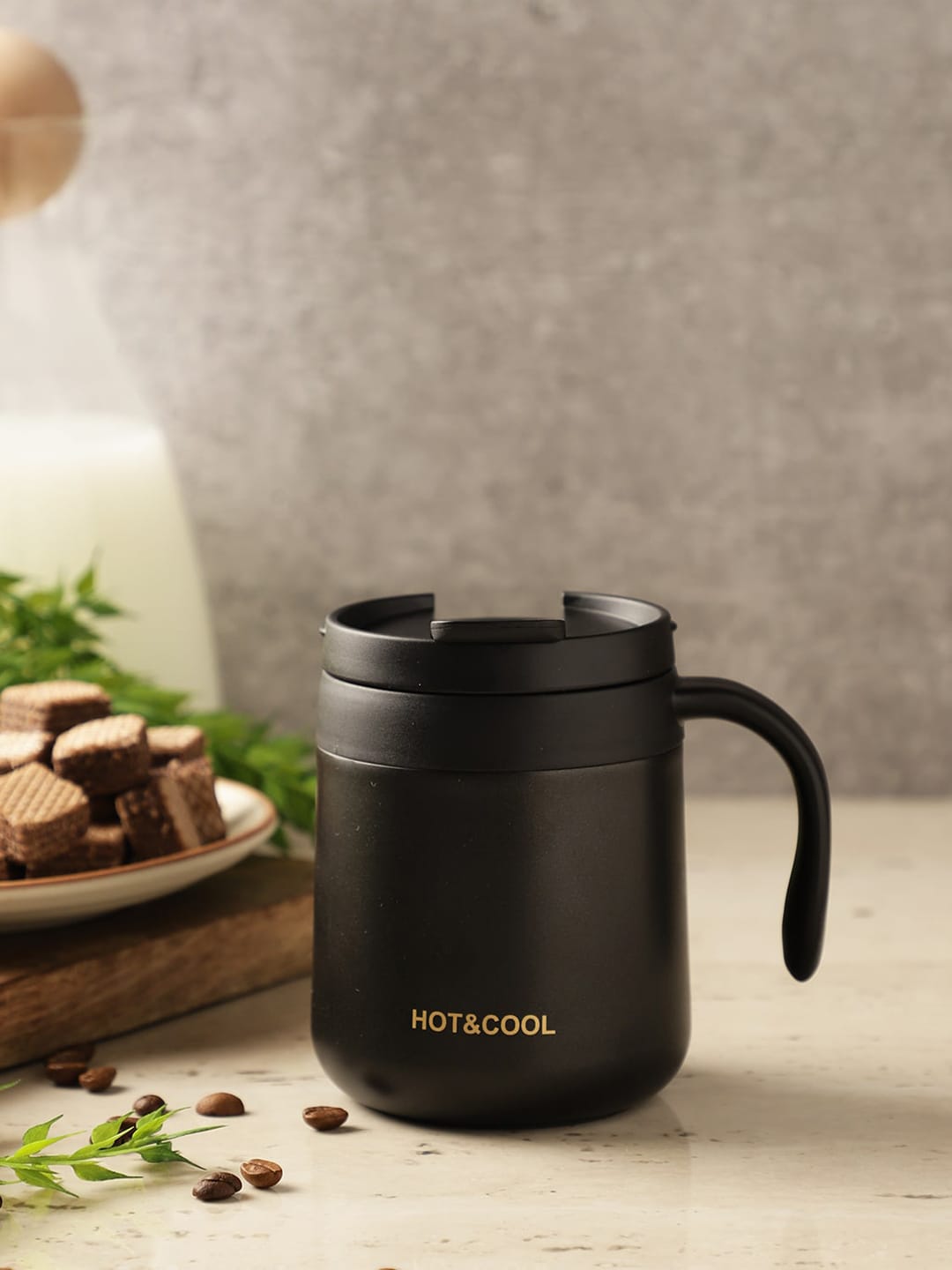 The Decor Mart Black Solid Stainless Steel Double Walled Insulated Travel Mug Price in India