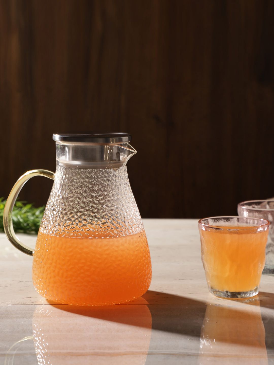 The Decor Mart Transparent Water Jug With Air Tight Cap & Golden Handle Price in India