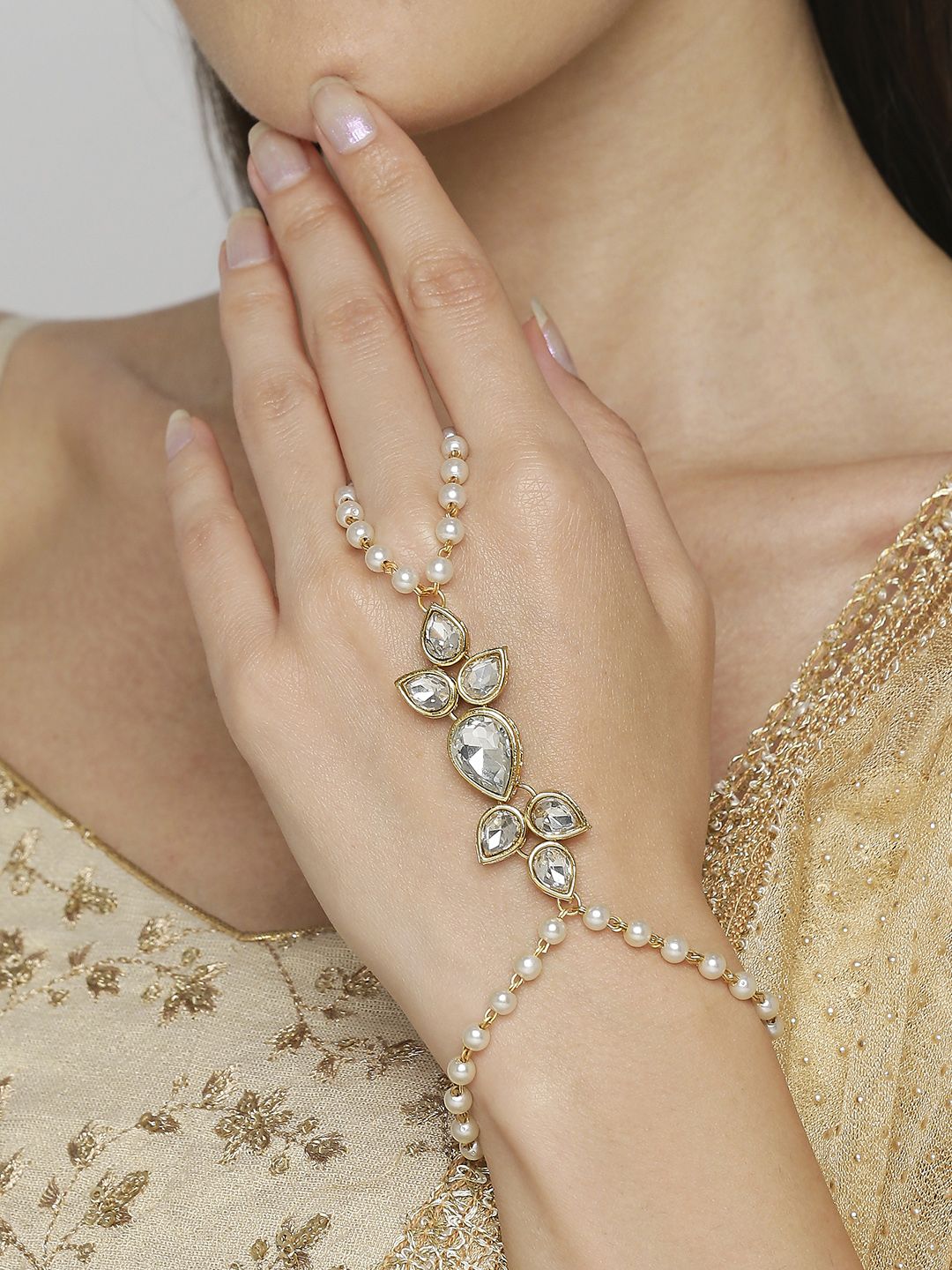 OOMPH Women Gold-Toned & White Hathphool Bracelet Price in India