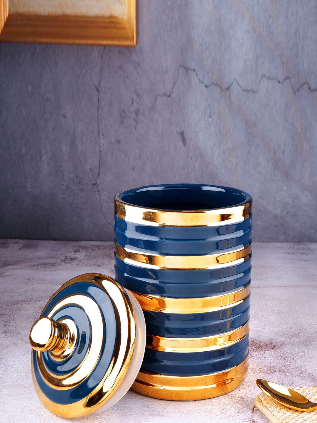 THE WHITE INK DECOR Blue & Gold-Toned Striped Ceramic Storage Jar Price in India