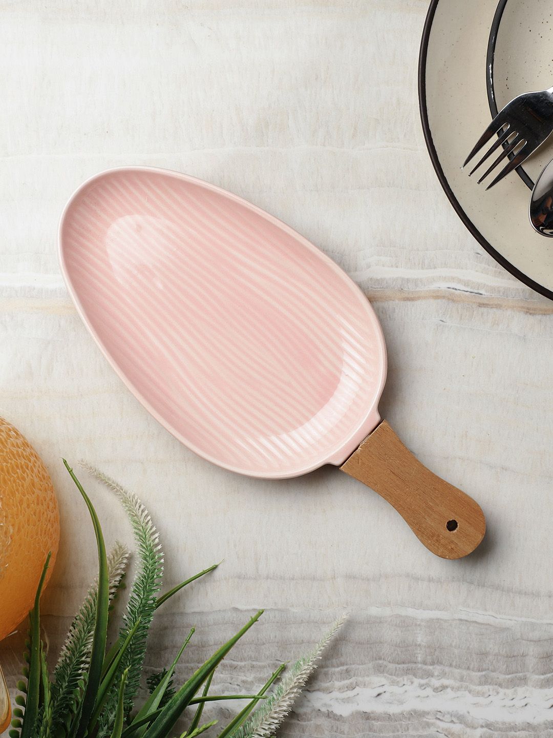 The Decor Mart Pink Textured Ceramic Serving Platter with Wooden Handle Price in India