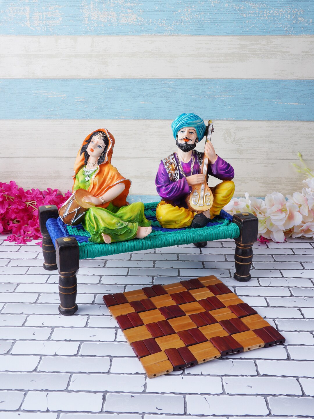 FASHIYANOO Multi-Coloured Rajasthani couple with khaat Showpieces Price in India