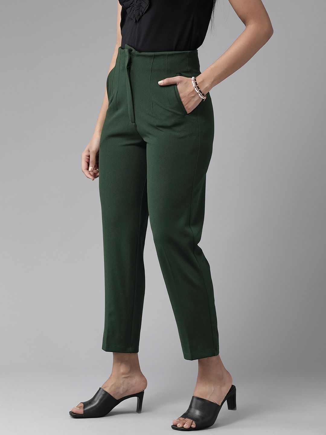KASSUALLY Women Green Solid Peg Trousers Price in India