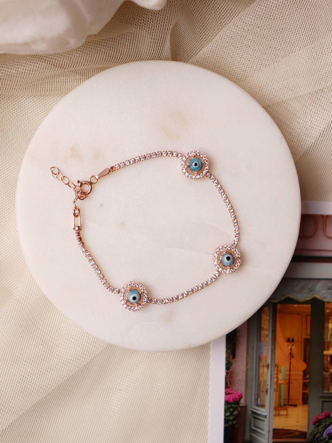 CURIO COTTAGE Women Pure Silver Rose Gold Plated Trio Evil Eye Bracelet Price in India